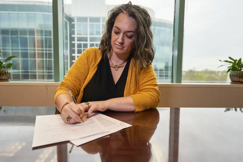 An examiner preparing to give expert testimony.